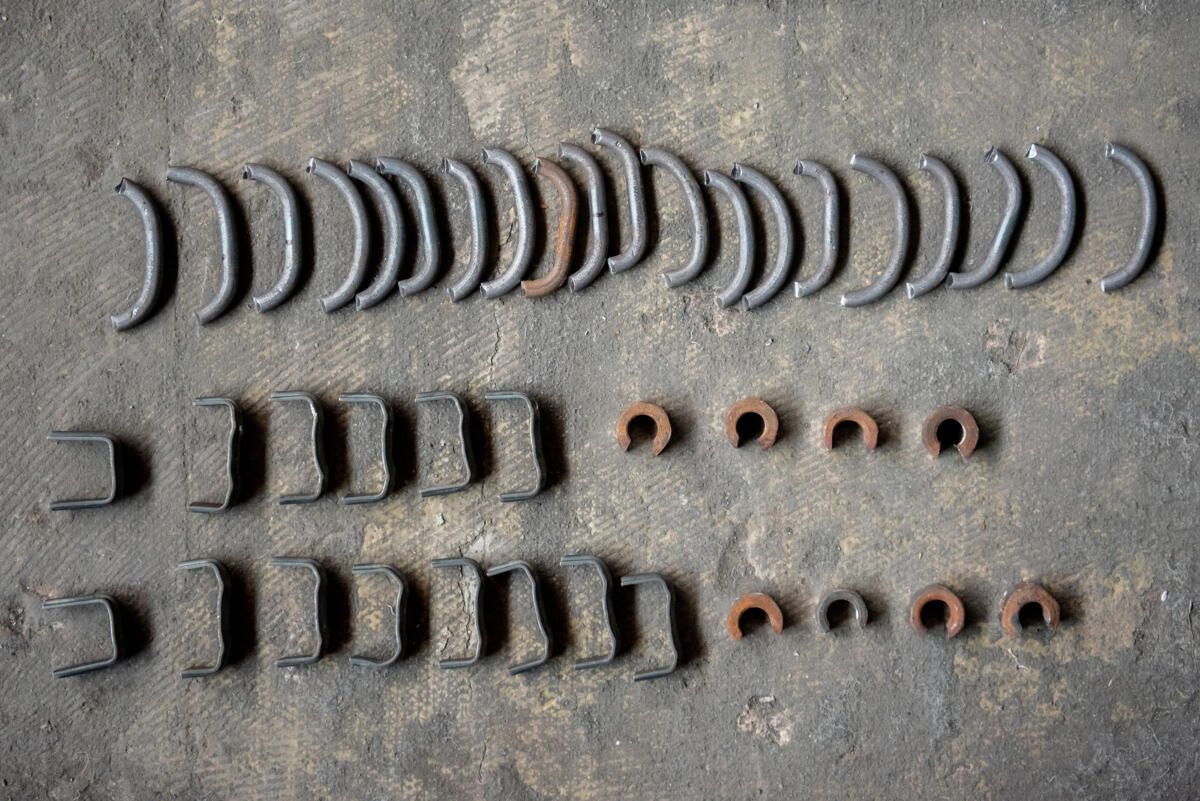 welding pieces arranged on concrete floor